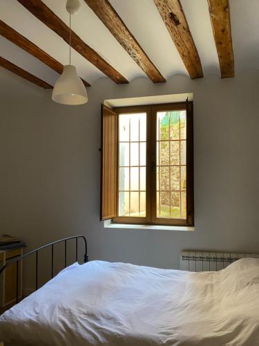 Krevet ili kreveti u jedinici u objektu Encantador Piso en la Antigua Casa de Correos