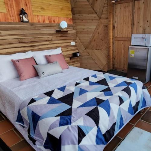 Кровать или кровати в номере Barichara Glamping Valley