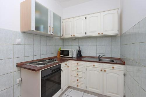 Kuchyň nebo kuchyňský kout v ubytování Twin Room Selce 2362a