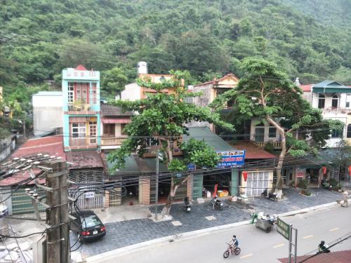 an overhead view of a town with a mountain at Ngan Ha Homestay in Ha Giang
