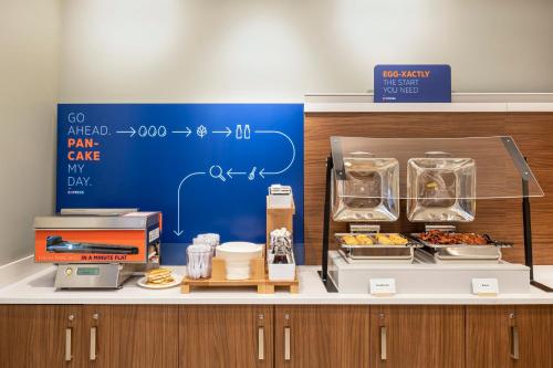 a counter with some food items on it at Holiday Inn Express Toronto Downtown by IHG in Toronto