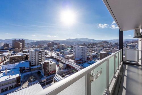 a view of a city from the balcony of a building at GLISTEN in Otaru