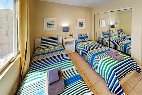 Säng eller sängar i ett rum på Asbury Haven