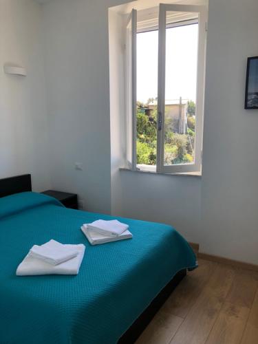 A bed or beds in a room at Harmony Affittacamere