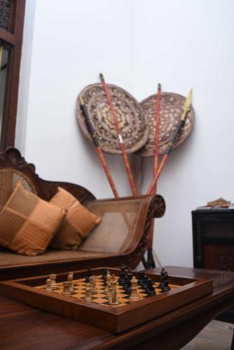 a chess board sitting on top of a table at Centauria Hill Resort in Ratnapura