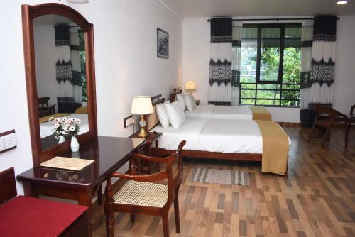 Кровать или кровати в номере Centauria Hill Resort