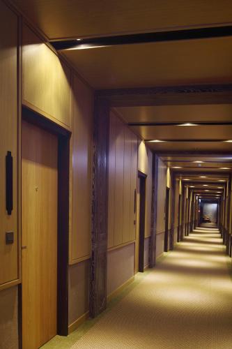 a hallway of a building with a long corridor at Chia Shih Pao Hotel in Taibao