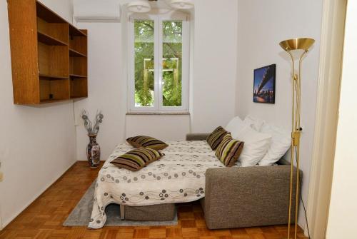 Posteľ alebo postele v izbe v ubytovaní Apartment Škunca