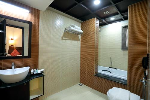 Un baño de The World Backwaters, Alleppey