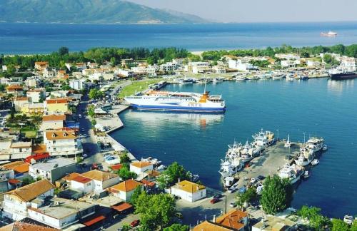 a large boat is docked in a harbor at Sea View in Keramotí