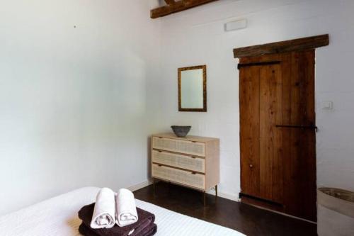 A bed or beds in a room at Casa Côté Sud - Mas Bois Fontaine