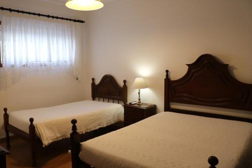 Postelja oz. postelje v sobi nastanitve Hotel Solar das Laranjeiras