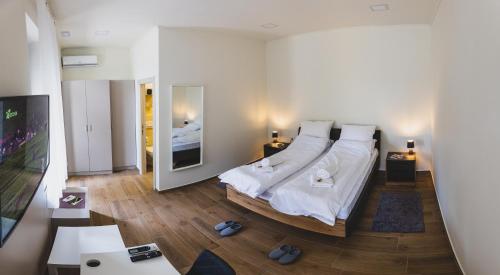Katil atau katil-katil dalam bilik di Vila Guliver