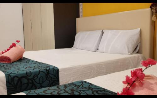 Ένα ή περισσότερα κρεβάτια σε δωμάτιο στο LCP T1 Honeymoon genting highland midhill homestay