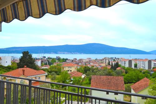 a view of a city from a balcony at Tivat Apartments in Tivat