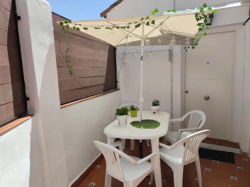 Foto Casa con Terraza Privada 6 min del Puente Nuevo 1