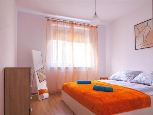 Postel nebo postele na pokoji v ubytování Zachodnia Apartamenty LUNA Białystok
