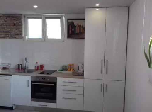 Dapur atau dapur kecil di Stone Guest House