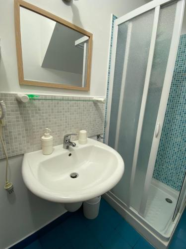 Koupelna v ubytování Diga Rooms