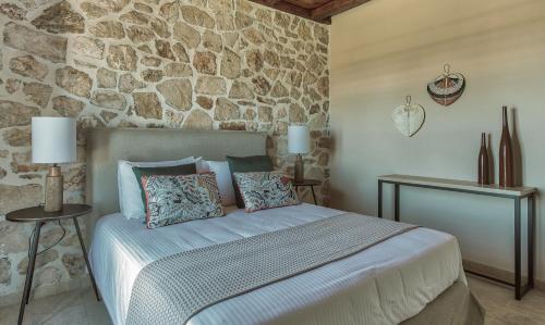 Ένα ή περισσότερα κρεβάτια σε δωμάτιο στο AGRIKIA VILLA