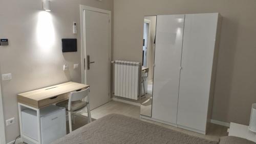 TV a/nebo společenská místnost v ubytování Bed and Breakfast De Rosa