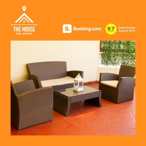 two chairs and a coffee table in a room at The House in Tacna