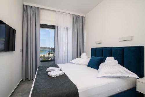 Posteľ alebo postele v izbe v ubytovaní Palm Springs