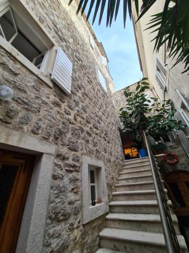a stairway leading up to a building at Beatrix Suites in Budva