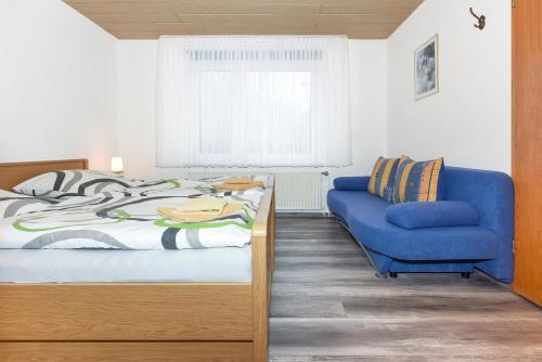 Postel nebo postele na pokoji v ubytování Pension Pradler Wohnung 3