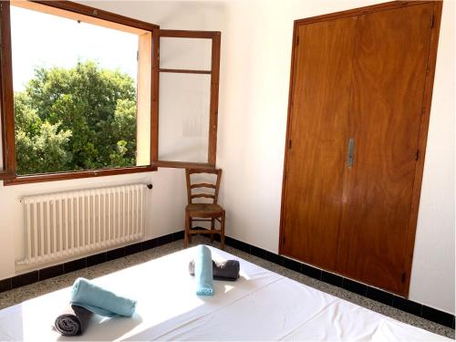 Ένα ή περισσότερα κρεβάτια σε δωμάτιο στο Villa Provençale avec vue mer panoramique