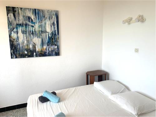 Ένα ή περισσότερα κρεβάτια σε δωμάτιο στο Villa Provençale avec vue mer panoramique