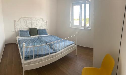 Posteľ alebo postele v izbe v ubytovaní Daniela Family Apartment - top floor - new & quite location - great sea & island view