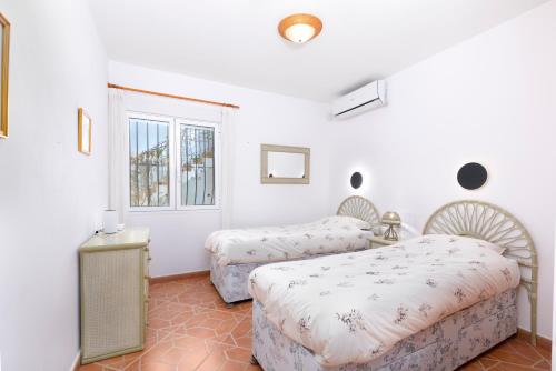 Ένα ή περισσότερα κρεβάτια σε δωμάτιο στο Casa Sueños