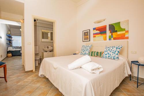 Katil atau katil-katil dalam bilik di Residence Sole Dell'Argentario