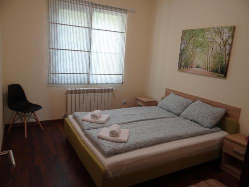 מיטה או מיטות בחדר ב-Villa Camino