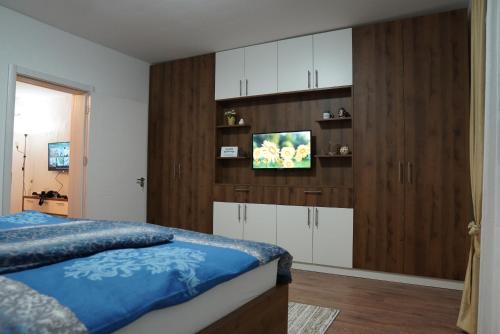 Säng eller sängar i ett rum på Apartments Manitovac M
