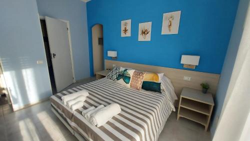 Posteľ alebo postele v izbe v ubytovaní La terrazza del Sole Guest House