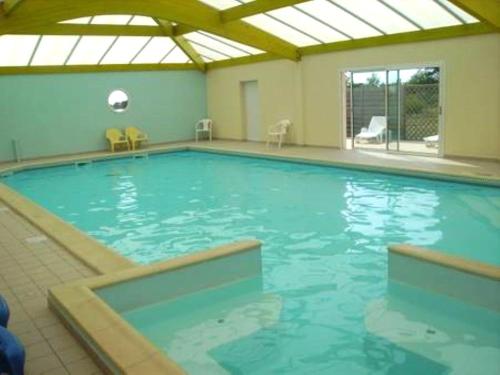 Kolam renang di atau dekat dengan Le Cocon des Dunes - piscines chauffees