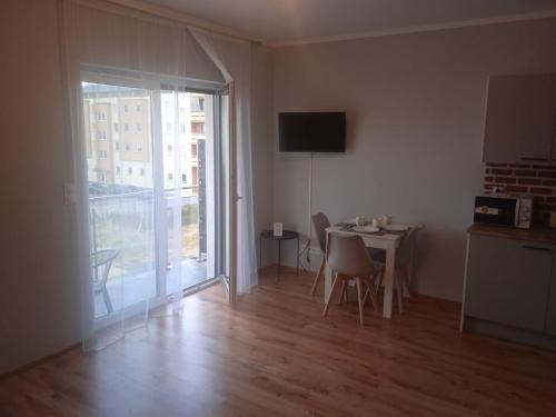 Kuchyňa alebo kuchynka v ubytovaní Przytulny apartament w sercu Karkonoszy