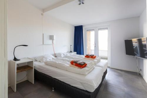 Posteľ alebo postele v izbe v ubytovaní Appartement in Zeeland - Kabbelaarsbank 506 - Port Marina Zélande - Ouddorp - not for companies
