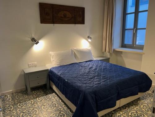 Postel nebo postele na pokoji v ubytování Mercato Vecchio House