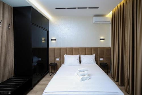 Кровать или кровати в номере Hotel Three