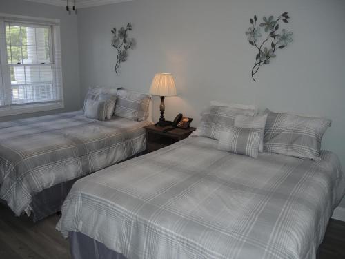 Voodi või voodid majutusasutuse Brunswick Plantation Golf Condo 307M toas