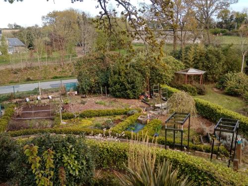 a garden from the top of the house at Le Rocher du Samoyède in Dirinon