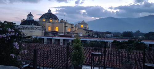 a view of a building with yellow lights on it at Hotel Casa Real Antigua in Antigua Guatemala