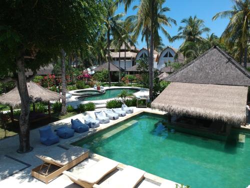 an image of a swimming pool at a resort at Trawangan Oasis in Gili Trawangan