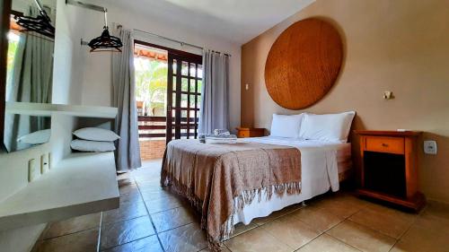 Llit o llits en una habitació de Chalé Fantástico - Centro de Pipa - Resort Pipa