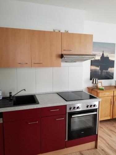 Una cocina o cocineta en Altstadt Ferienwohnung Stralsund mit Parkplatz