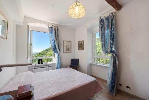 Postel nebo postele na pokoji v ubytování Cottage con vista mare