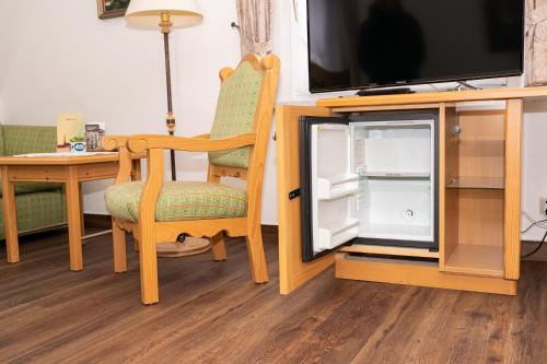 TV o dispositivi per l'intrattenimento presso Hotel und Berggasthof Zum Sonnenhof